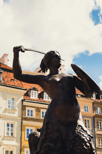 The Statue of Mermaid of Warsaw, Polish Syrenka Warzawska, symbol of Warsaw in the Old Town Market Square. Travel attraction tourist destination