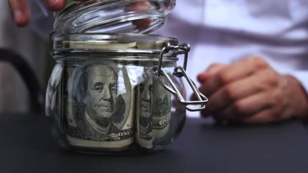 Dollar Banknote Saving Money Glass Jar Inglês Homem Irreconhecível Consumo — Vídeo de Stock