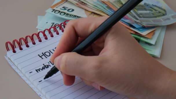 Female Hand Writing Counting Expenses Bills Housing Electricity Gas Water — Stock Video