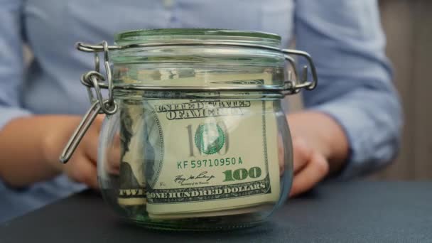 Unrecognizable Woman Turn Saving Money Glass Jar Filled Dollars Banknotes — Stock Video