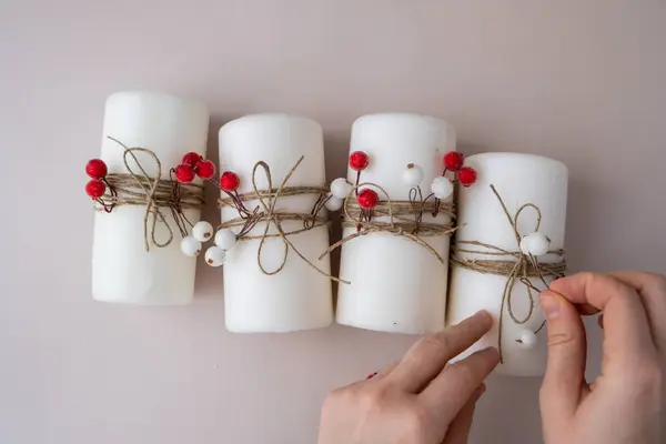 stock image Step by step instruction of making handmade Christmas advent four weeks candle calendar. Female hands creating craft homemade decor. New year celebration. Winter holidays. Do it yourself