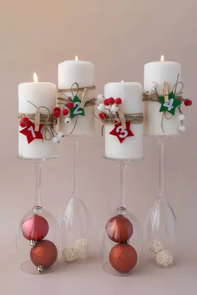 stock image Four Advent candles calendar with Christmas zero waste decorations. Holiday preparation copy space for text. Catholic traditions of Christmas countdown new year winter holidays 