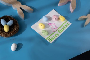 EASTER eggs and bunny painting Sustainable preparation Diy process of making handmade greeting cards. Step by step activity for children. Inclusive and responsible stress relief holiday hobby clipart