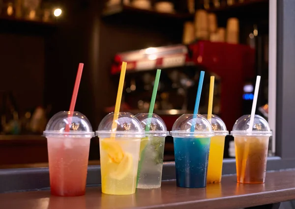 colorful drinks with straws