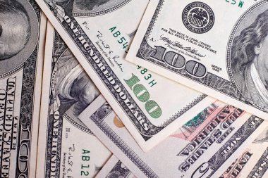 Arka plan olarak dolar banknotları, üst görünüm. Para ve finans