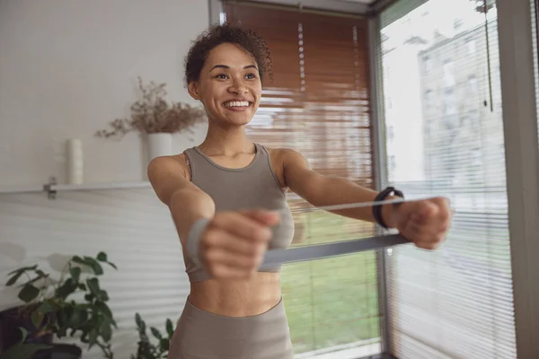 Afro American Woman Doing Exercises Hands Online Tutorials Laptop Home Royalty Free Stock Photos