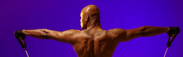Man Performs Exercises Expander Studio Background Color Filter Strength Motivation — Foto de Stock
