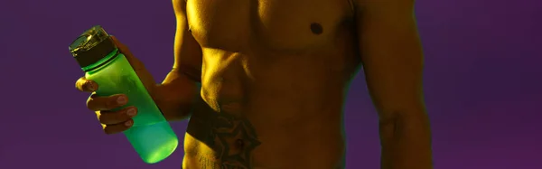 Sporty Man Muscled Naked Torso Holding Bottle Water Studio Background — Stock fotografie