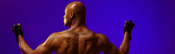 Man Performs Exercises Expander Studio Background Color Filter Strength Motivation — Stok fotoğraf