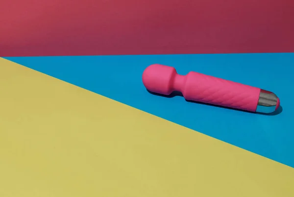 stock image Pink dildo vibrator on colored background with shadows. Sex toy for adult. High quality photo