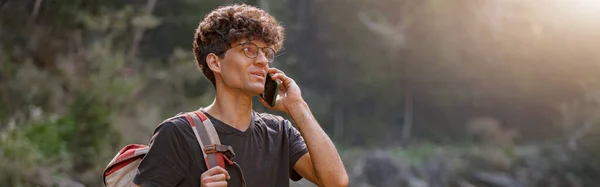 Young Male Traveler Walking Mountains River Talking Mobile Phone Hiking —  Fotos de Stock