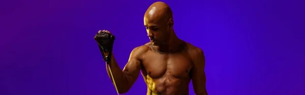 Man Performs Exercises Expander Studio Background Color Filter Strength Motivation —  Fotos de Stock