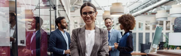 Smiling Businesswoman Standing Modern Office Colleagues Background Looking Camera — Stockfoto