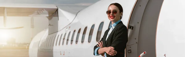 Woman Flight Attendant Sunglasses Standing Airplane Stairs Airport Blurred Background — Stok Foto