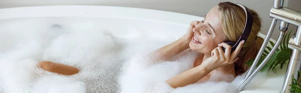 Cheerful Young Woman Headphones Smiling Listening Music Bath Bubbles Top — ストック写真