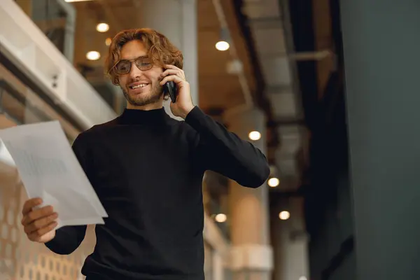 Handsome Male Freelancer Eyeglass Talking Phone Standing Modern Coworking Space — Stok Foto