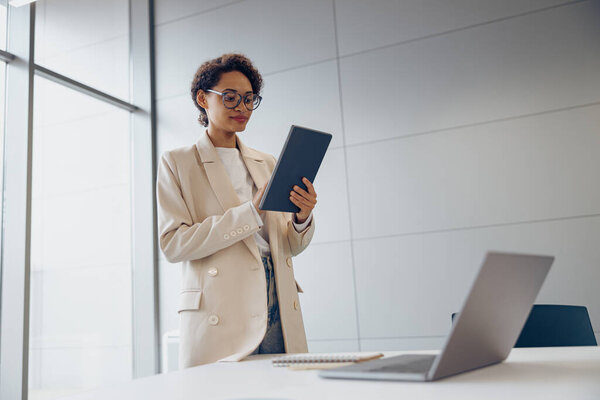 Smiling Female Freelancer Working Digital Tablet Standing Coworking Background Stock Photo