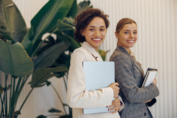 Stylish Female Freelancers Laptop Digital Tablet Standing Coworking Looks Camera Royalty Free Stock Images