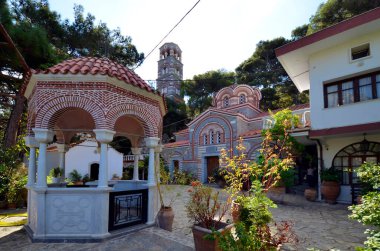 Greece, Crete, monastery of Saint George of Selinari with bell tower, church and fountain