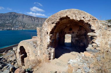 Greece, Crete, buildings built of stone in old Venetian Fortress Spinalonga, until 1957 used as a leper station, now a popular tourist destination, tripartite building