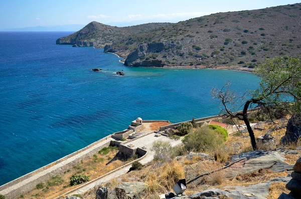 Greece, Crete, view to Kalydon peninsula from old Venetian Fortress Spinalonga, until 1957 used as a leper station, now a popular tourist destination