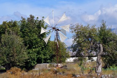 Greece, Crete, the Lasithi plateau is mainly used for agriculture, the traditional wind turbines were used in an environmentally friendly way to obtain water