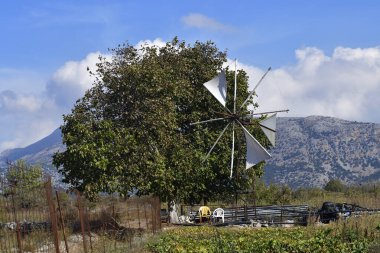 Greece, Crete, the Lasithi plateau is mainly used for agriculture, the traditional wind turbines were used in an environmentally friendly way to obtain water