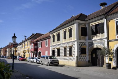 Rust, Austria - March 23, 2024: Main street of the so-called stork town on Lake Neusiedl with its colourful and picturesque houses in the UNESCO world heritage site in Burgenland clipart