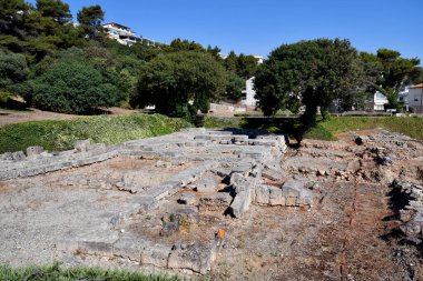 Greece, Kassandra, ruins of the temple of Zeus Ammon which is considered a sanctuary, the ancient site is located directly on the beach of the tourist stronghold Kallithea and is freely open to visitors clipart