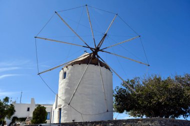 Greece, old windmill on Anna Hill on the Cycladic Island Paros  clipart