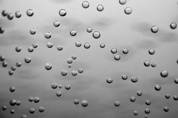 Pozadí Zblízka Záběr Vodní Bubliny Podsvícené Láhvi — Stock fotografie