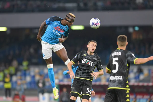 stock image Victor Osimhen (9) SSC Napoli 1926 heads the ball as fighting with Adrian Ismajli (34) Empoli F.C. 1920 during the Italian Championship Serie A 2022/2023 football match between SSC Napoli vs Empoli F.C. on November 8, 2022 at the Stadium Diego Armand