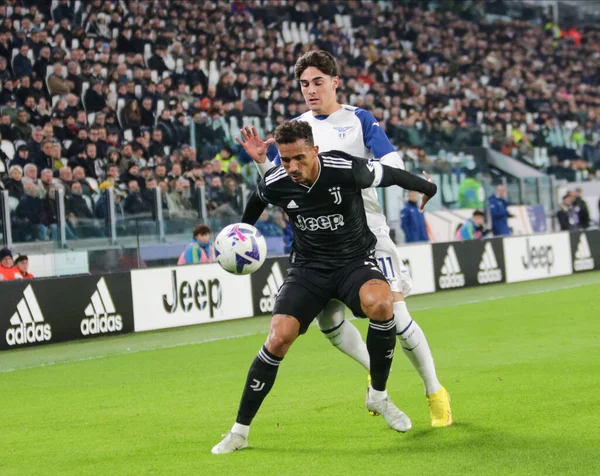 Dusan Vlahovic of Juventus and Christiano Biraghi of Acf Fiorentina during  the Italian serie A, football match between Juventus Fc and Acf Fiorentina  on 12 February 2023 at Allianz Stadium, Turin, Italy.