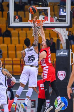 #Euroleague maçında Virtus Segafredo Bologna 'dan 25 JORDAN MICKEY, Olympiacos Pire ve Virtus Segafredo Bologna arasında 9 Aralık 2022 tarihinde Atina, Yunanistan' da oynanan karşılaşma. - Fotoğraf: Stefanos Kyriazis / LiveMedi