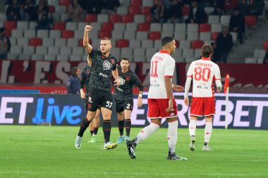 George Puscas (Cenova CFC), 26 Aralık 2022 'de İtalya' nın Bari kentindeki San Nicola Stadyumu 'nda oynanan SSC Bari-Genoa CFC karşılaşmasında attığı golü kutluyor - Fotoğraf: Emmanuele Mastrodonat