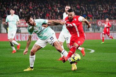 Francesco Acerbi (FC Inter) and Patrick Ciurria (AC Monza) during italian soccer Serie A match AC Monza vs Inter - FC Internazionale at the U-Power Stadium in Monza, Italy, January 07, 2023 - Credit: Luca Rossin