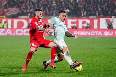 Lautaro Martinez (FC Inter) and Patrick Ciurria (AC Monza) during italian soccer Serie A match AC Monza vs Inter - FC Internazionale at the U-Power Stadium in Monza, Italy, January 07, 2023 - Credit: Luca Rossin