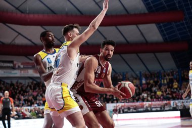 Mitchell Watt (Umana Reyer Venezia) and Davide Casarin (Tezenis Verona) and Aric Holman (Tezenis Verona) during Italian Basketball A Serie  Championship Umana Reyer Venezia vs Tezenis Verona at the Taliercio in Venice, Italy, January 08, 2023 - Credi