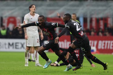 Pierre Kalulu of AC Milan dscores a goal uring Serie A 2022/23 football match between AC Milan and AS Roma at San Siro Stadium, Milan, Italy on January 08, 2023 - Credit: Fabrizio Carabelli/LiveMedi