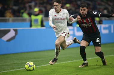 Nicola Zalewski of As Roma and Theo Hernandez of Ac Milan during the Italian Serie A, football match between Ac Milan and As Roma on Jannuary 08, 2023 at San Siro Stadium, Milan, Italy. Photo Nderim Kaceli - Credit: Nderim Kaceli/LiveMedi