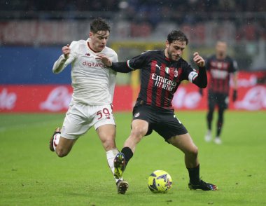 Davide Calabria of Ac Milan and Nicola Zalewski of As Roma during the Italian Serie A, football match between Ac Milan and As Roma on Jannuary 08, 2023 at San Siro Stadium, Milan, Italy. Photo Nderim Kaceli - Credit: Nderim Kaceli/LiveMedi