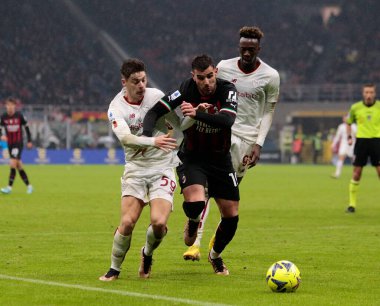 Theo Hernandez of Ac Milan and Nicola Zalewski of As Roma during the Italian Serie A, football match between Ac Milan and As Roma on Jannuary 08, 2023 at San Siro Stadium, Milan, Italy. Photo Nderim Kaceli - Credit: Nderim Kaceli/LiveMedi