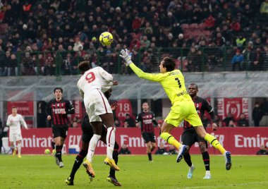 Tammy Abraham of As Roma and Ciprian Tatarusanu of Ac Milan  during the Italian Serie A, football match between Ac Milan and As Roma on Jannuary 08, 2023 at San Siro Stadium, Milan, Italy. Photo Nderim Kaceli - Credit: Nderim Kaceli/LiveMedi