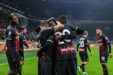Pierre Kalulu of AC Milan celebrates with his teammates after scoring a goal during Serie A 2022/23 football match between AC Milan and AS Roma at San Siro Stadium, Milan, Italy on January 08, 2023 - Credit: Fabrizio Carabelli/LiveMedi