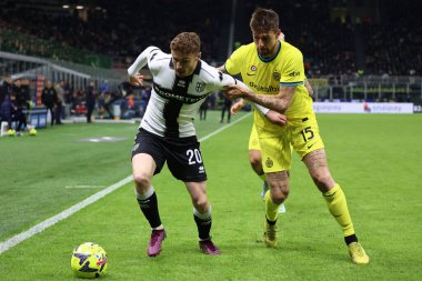 Antoine Hainaut of PARMA CALCIO competes for the ball with Francesco Acerbi of INTER during Italian football Coppa Italia match Inter - FC Internazionale vs Parma Calcio at the  San Siro stadium in Milan, Italy, January 10, 2023 - Credit: Luca Amedeo