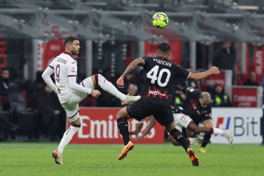 Antonio Sanabria of Torino FC competes for the ball with Aster Vranckx of AC Milan during Coppa Italia 2022/23 football match between AC Milan and Torino FC at San Siro Stadium, Milan, Italy on January 11, 2023 - Credit: Fabrizio Carabelli/LiveMedi