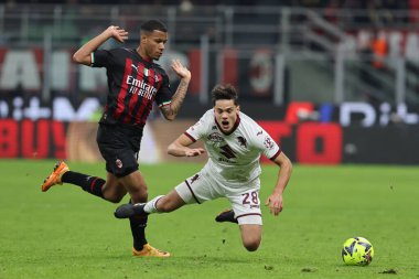Samuele Ricci of Torino FC competes for the ball with Aster Vranckx of AC Milan during Coppa Italia 2022/23 football match between AC Milan and Torino FC at San Siro Stadium, Milan, Italy on January 11, 2023 - Credit: Fabrizio Carabelli/LiveMedi