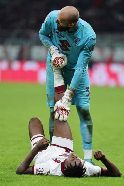 Wilfried Singo of Torino FC injured with Vanja Milinkovic-Savic of Torino FC during Coppa Italia 2022/23 football match between AC Milan and Torino FC at San Siro Stadium, Milan, Italy on January 11, 2023 - Credit: Fabrizio Carabelli/LiveMedi