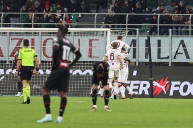 Ndary Adopo of Torino FC celebrates with his teammates after scoring a goal during Coppa Italia 2022/23 football match between AC Milan and Torino FC at San Siro Stadium, Milan, Italy on January 11, 2023 - Credit: Fabrizio Carabelli/LiveMedi