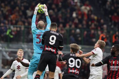 Olivier Giroud of AC Milan and Vanja Milinkovic-Savic of Torino FC in action during Coppa Italia 2022/23 football match between AC Milan and Torino FC at San Siro Stadium, Milan, Italy on January 11, 2023 - Credit: Fabrizio Carabelli/LiveMedi